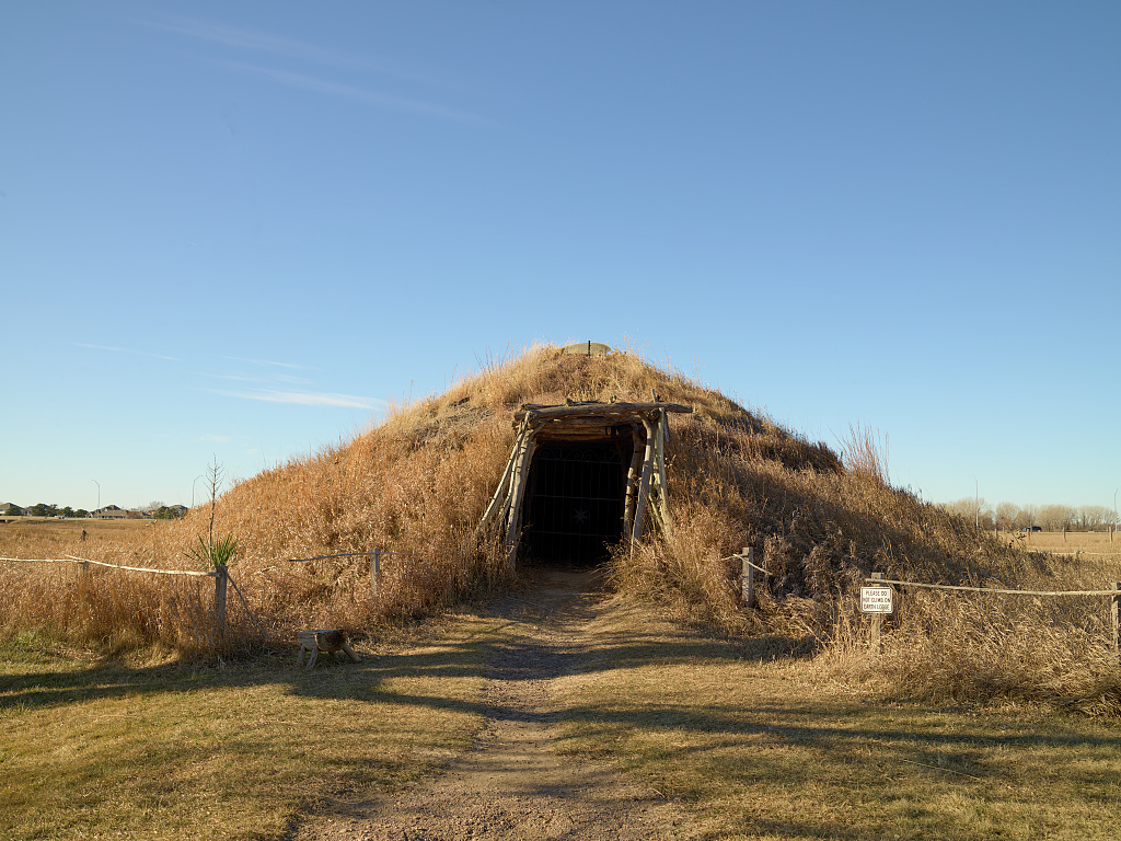 Exterior of a Pawnee earth lodge reconstruction at the Stuhr Museum of the Pioneer Prairie, Nebraska